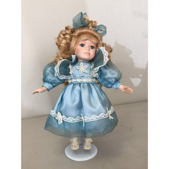 Collectors Choice Doll by Dan Dee Porcelain Blonde Doll Blue Dress Blue Eyes main image 0